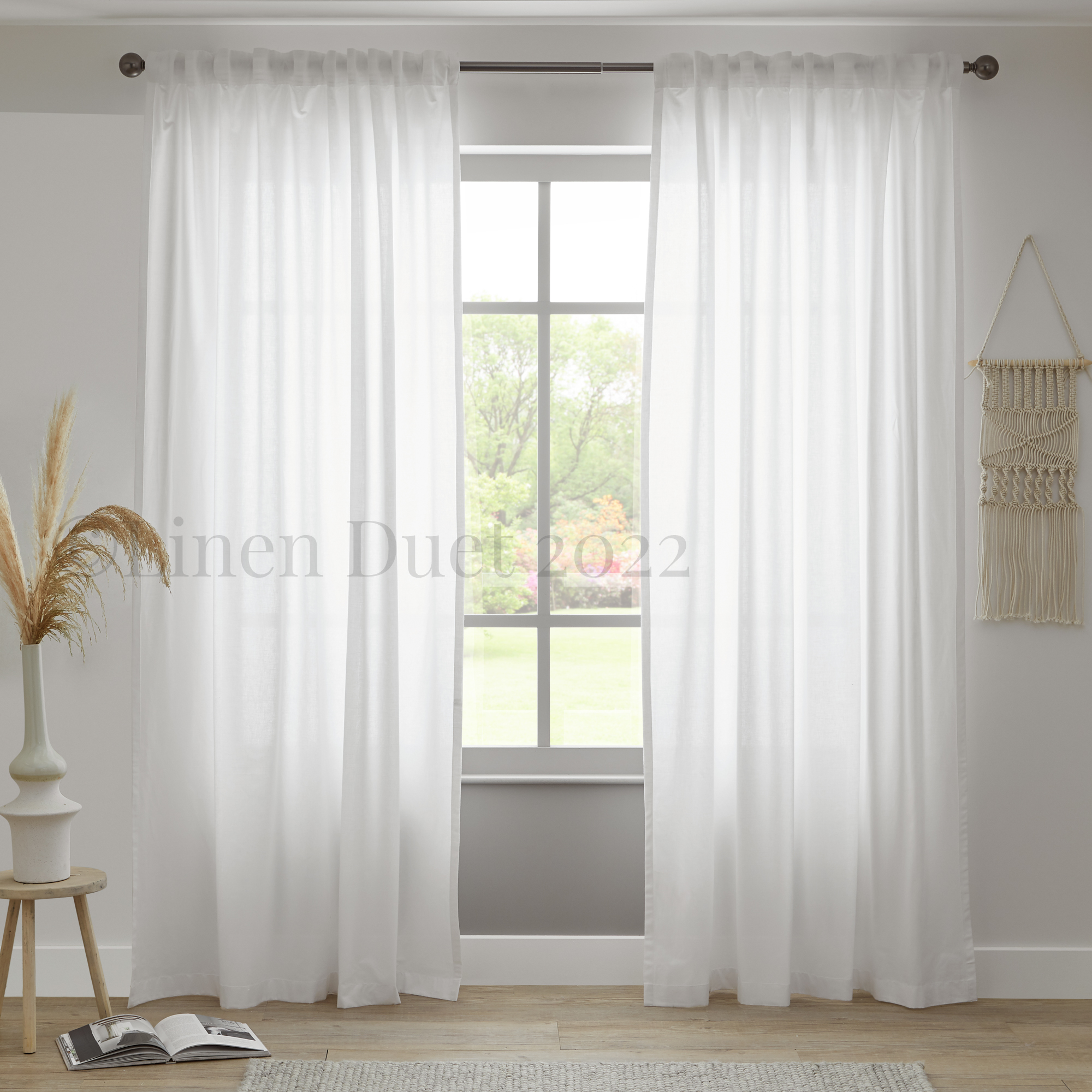 White cotton curtains with back tabs